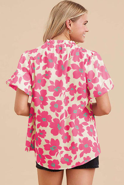 Blusa con escote con volantes y mangas abullonadas con estampado floral beige