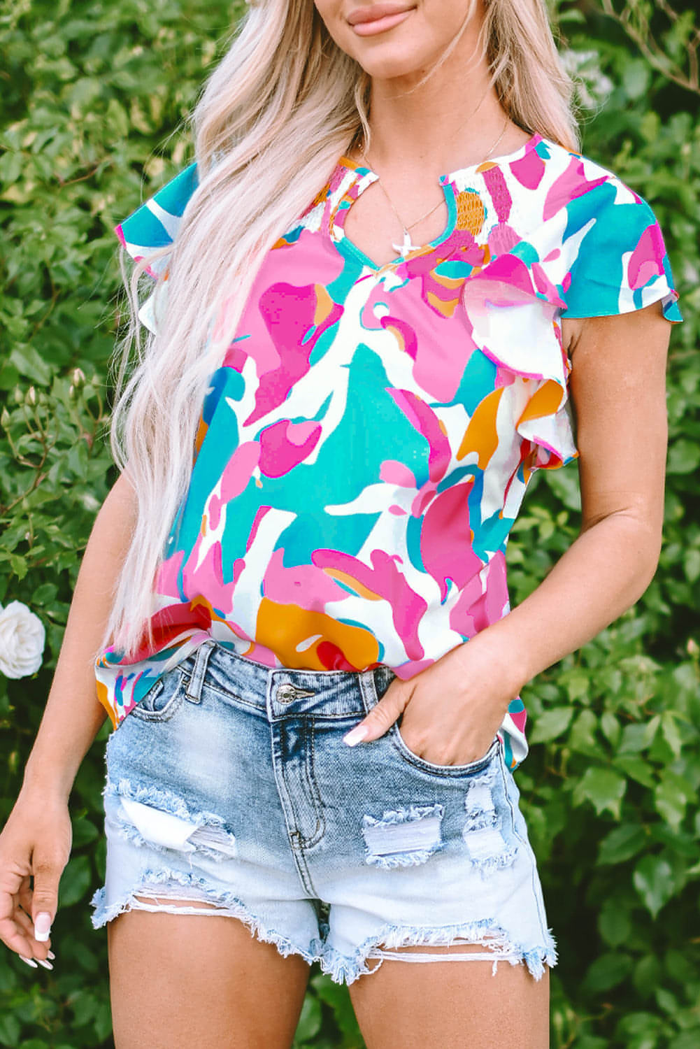 Blusa de manga de flagelo com estampa abstrata de impressão abstrata multicolor