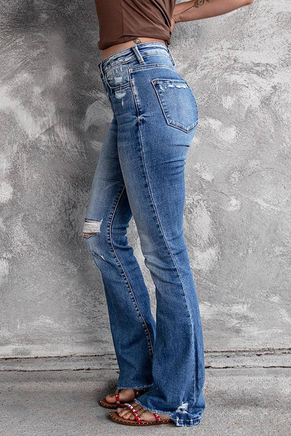 Blauwe noodlijdende flare jeans