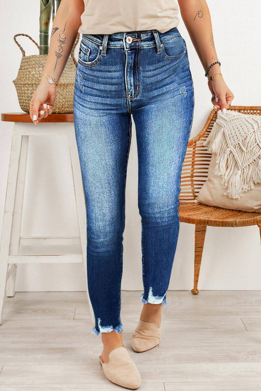 Blauwe ruwe zoom enkelgere span jeans