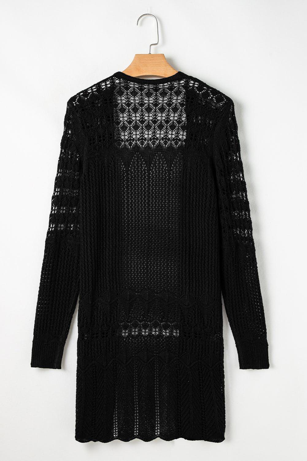 Cardigan noir ouvert sur le devant ajouré au crochet