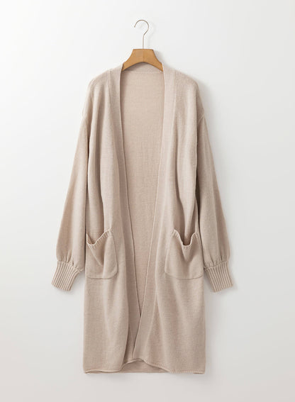 Beige sidelommer åpen front lang strikket cardigan