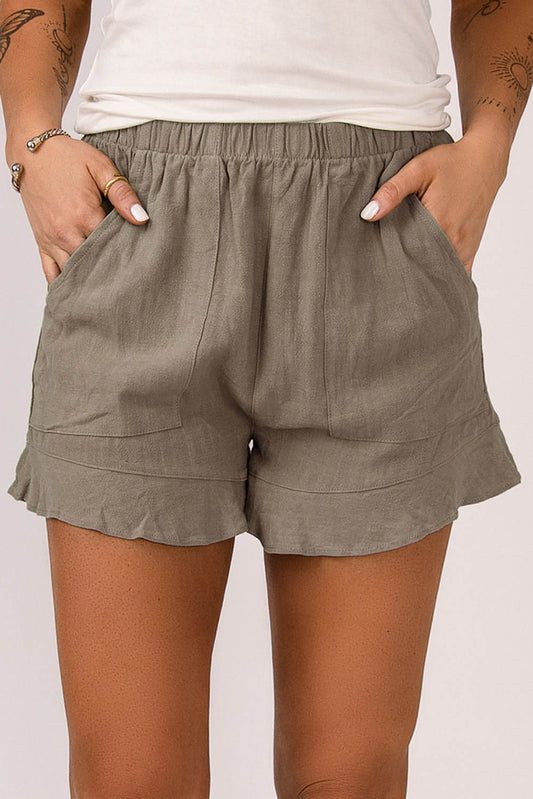 Khakifarbene Rüschenshorts mit hoher Taille und Taschen