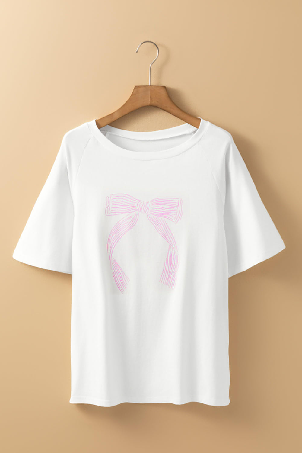 Set da salotto casual in due pezzi con stampa fiocco rosa e vestibilità ampia