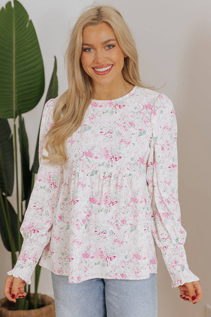 Roze bloemenprint gesmokte babydollblouse met ballonmouwen en sleutelgat aan de achterkant