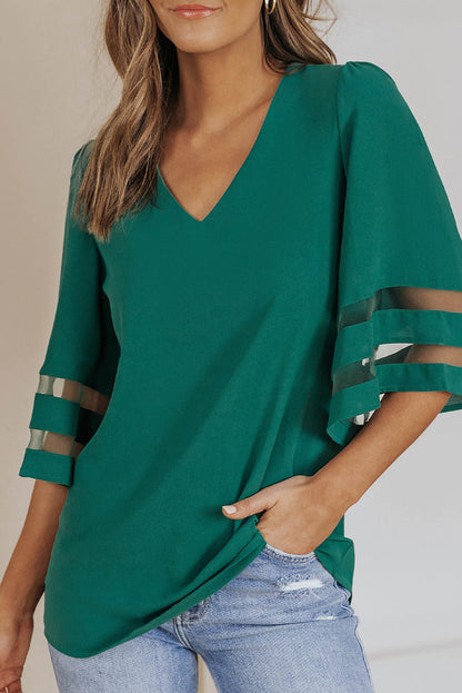 Blusa suelta con escote en V y mangas acampanadas de color verde