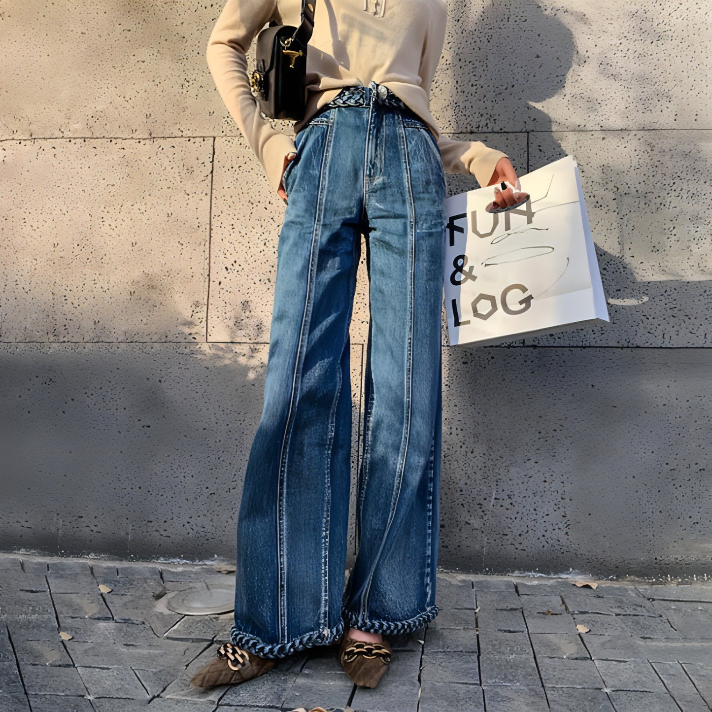 Jeans de perna larga e trançada feminina