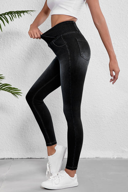 Jeggings ajustados elásticos con cintura arqueada en color negro