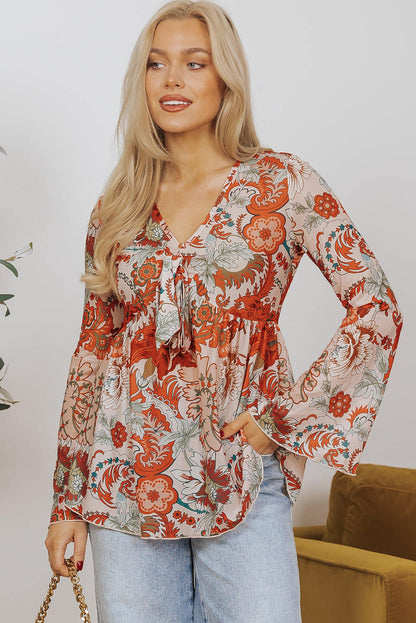 Oransje blomsterutskrift Dyp V-hals knute Bell Sleeve Bluse