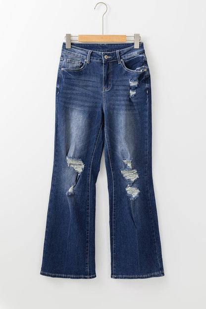 Dunkelblaue Jeans mit hohem Bund und Rissen in Mineralwaschung