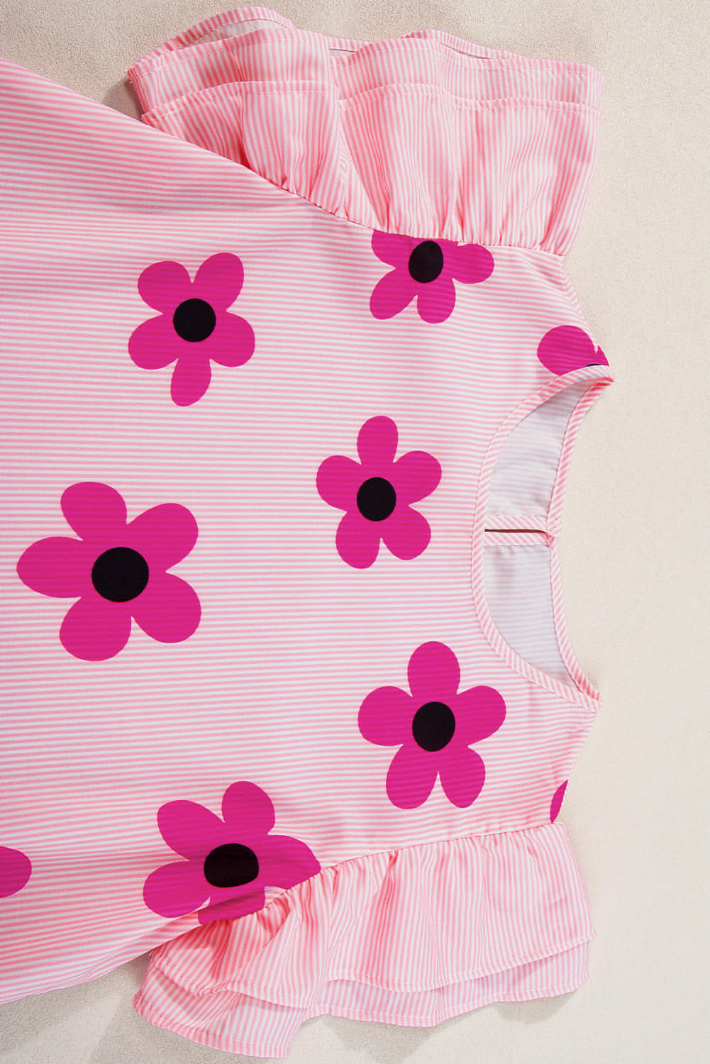 Blusa con volantes y mangas abullonadas con estampado floral de rayas rosas