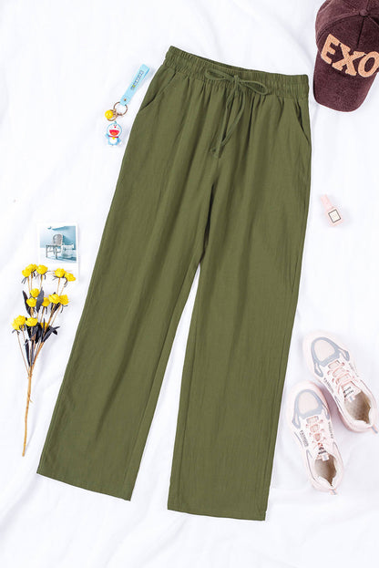 Pantaloni con gambe lunghe e dritte con tasche elastiche in vita con coulisse verde