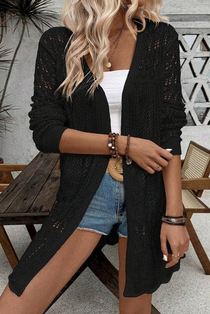 Cardigan noir ouvert sur le devant ajouré au crochet