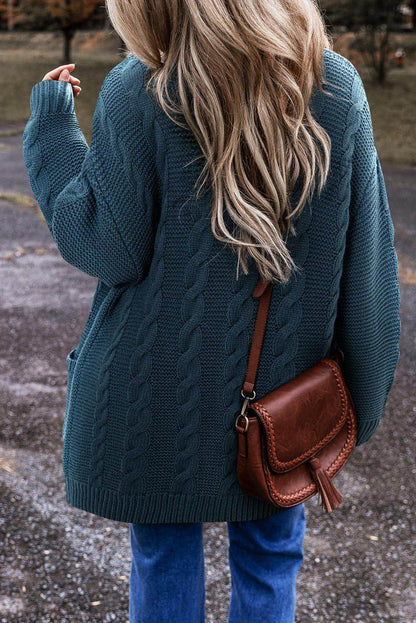 Pfauenblau -Kabel -Knit -Knopf -Vordertaschen mit Baggy Strickjacke