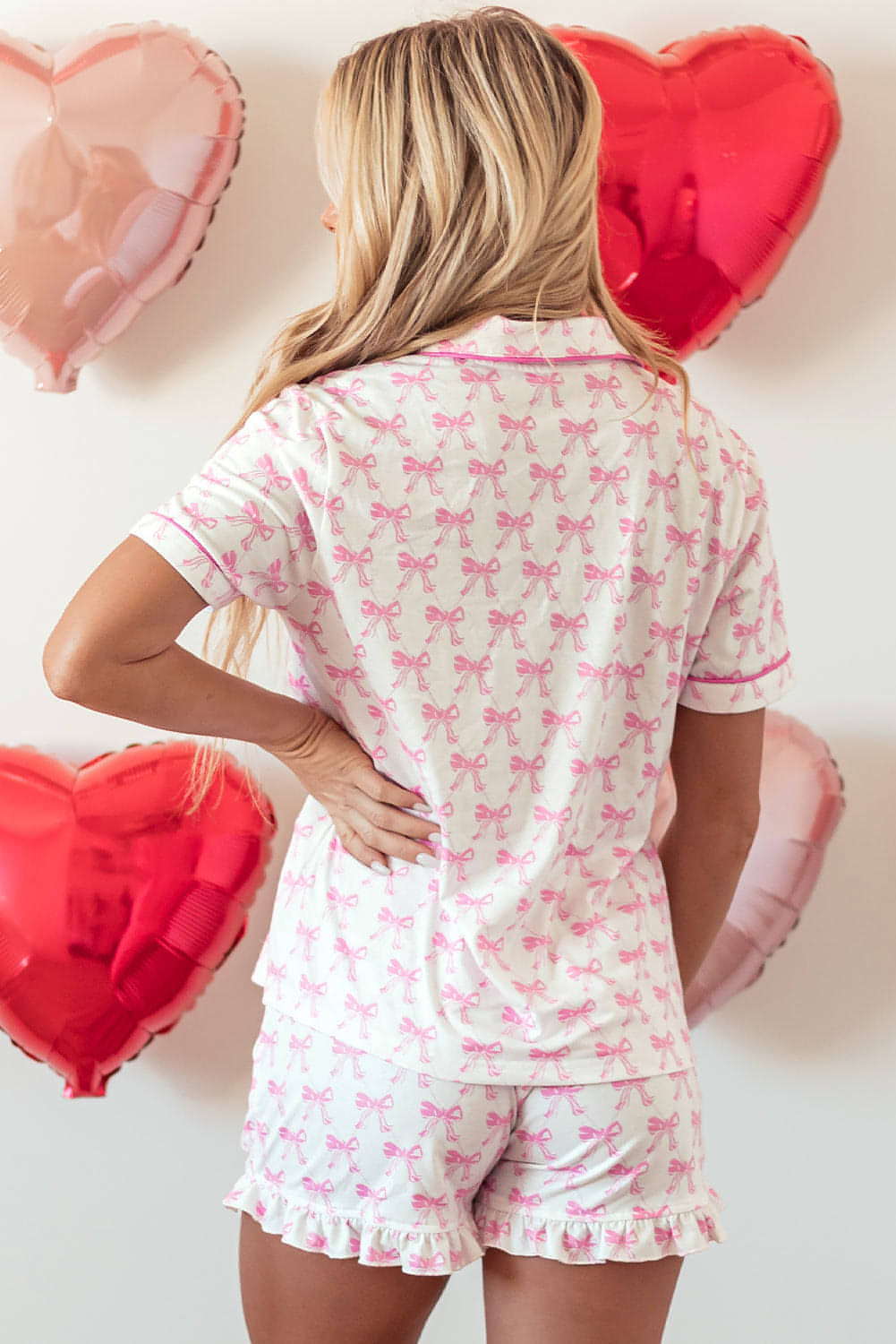 Ensemble pyjama rose imprimé nœud papillon à manches courtes et short à volants