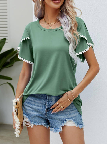 Pom-pom trim fladder hylsa rund hals t-shirt