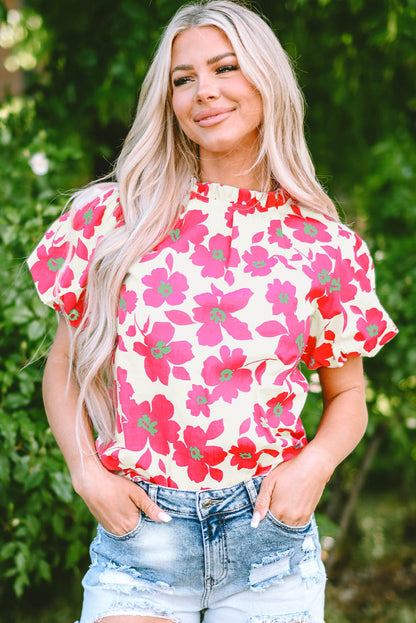 Blusa con escote con volantes y mangas abullonadas con estampado floral beige