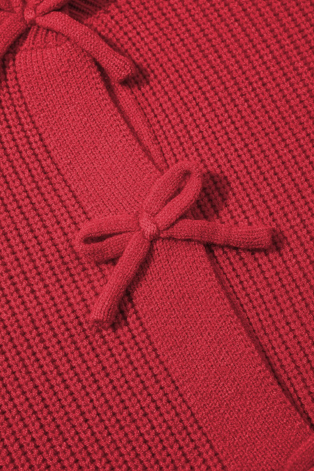 Cardigan boutonné en tricot côtelé rouge vif avec nœud sur le devant