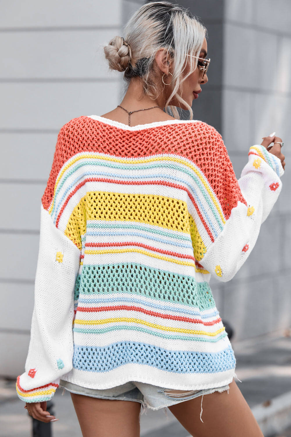 Maglione con maniche a contrasto in maglia a righe cave multicolor