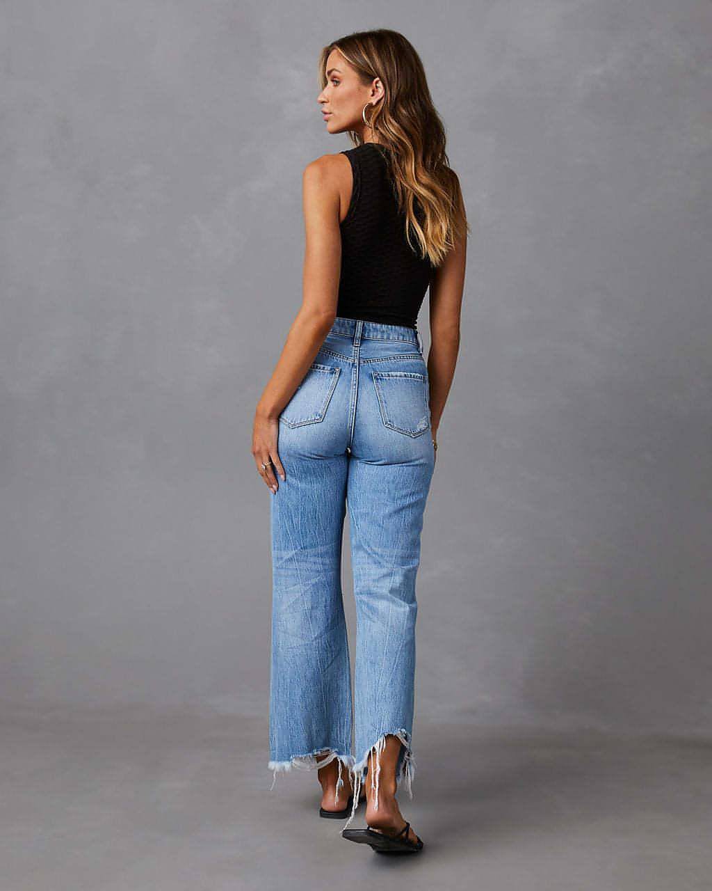 Calça de cintura alta jeans das mulheres