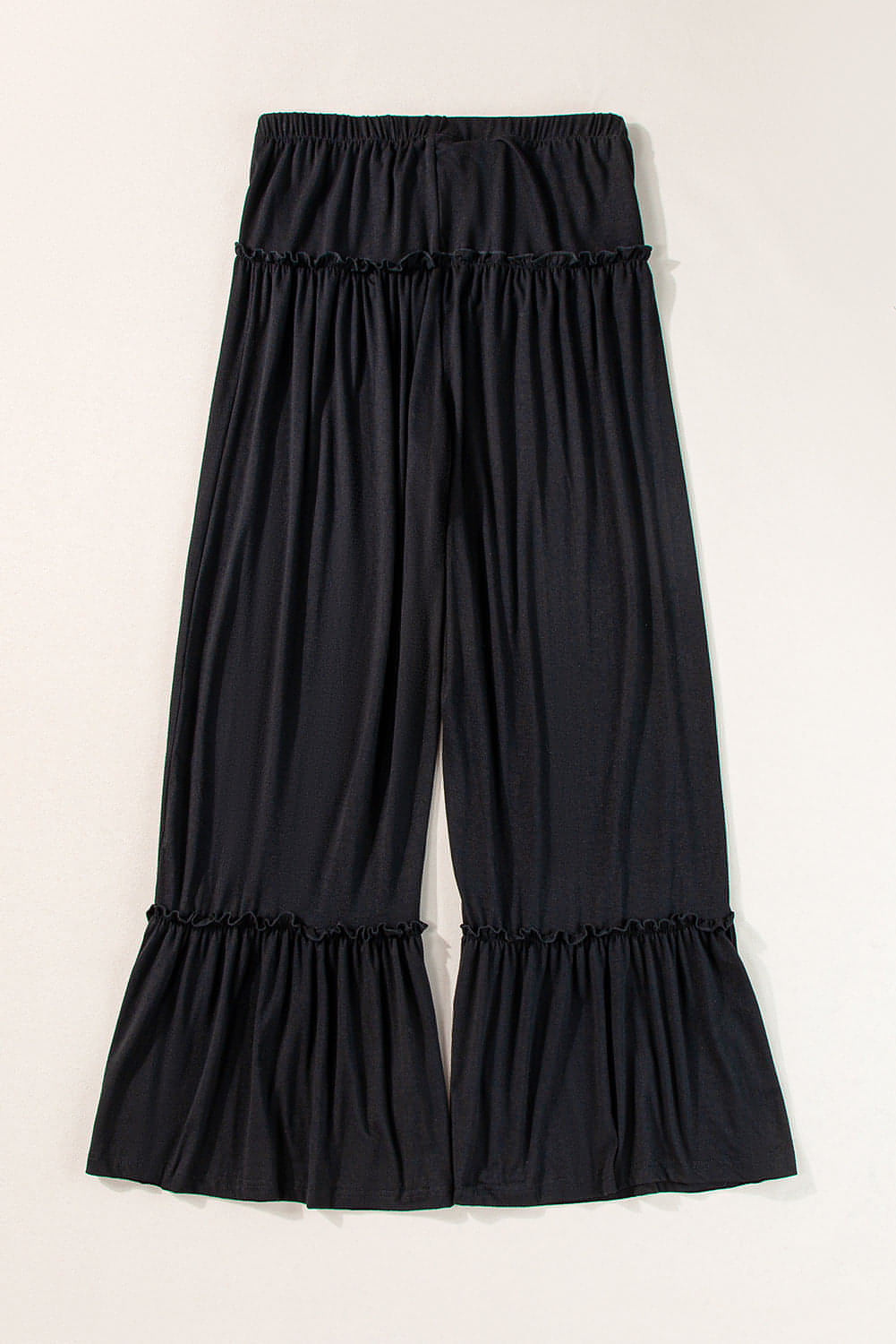 Pantalon large noir à taille haute et cordon de serrage à volants