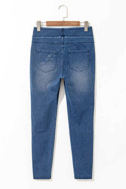 Marineblauwe skinny jegging met elastische taille, enkellange middelhoge taille en zakken