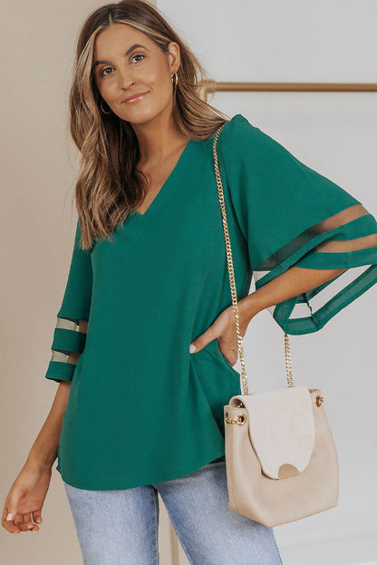 Blusa suelta con escote en V y mangas acampanadas de color verde