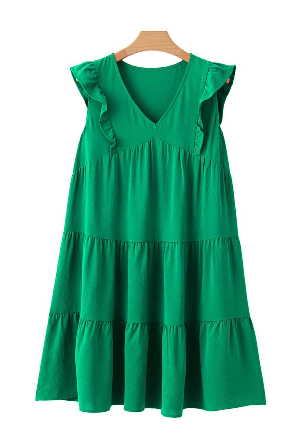 Vestido corto con escote en V, volantes y capas en color verde brillante