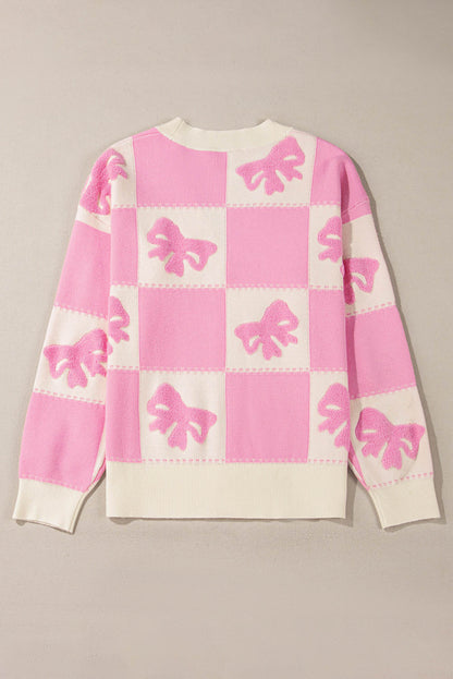 Cardigan con bottoni e scollo a V con motivo a quadretti con fiocco rosa e spalla abbassata