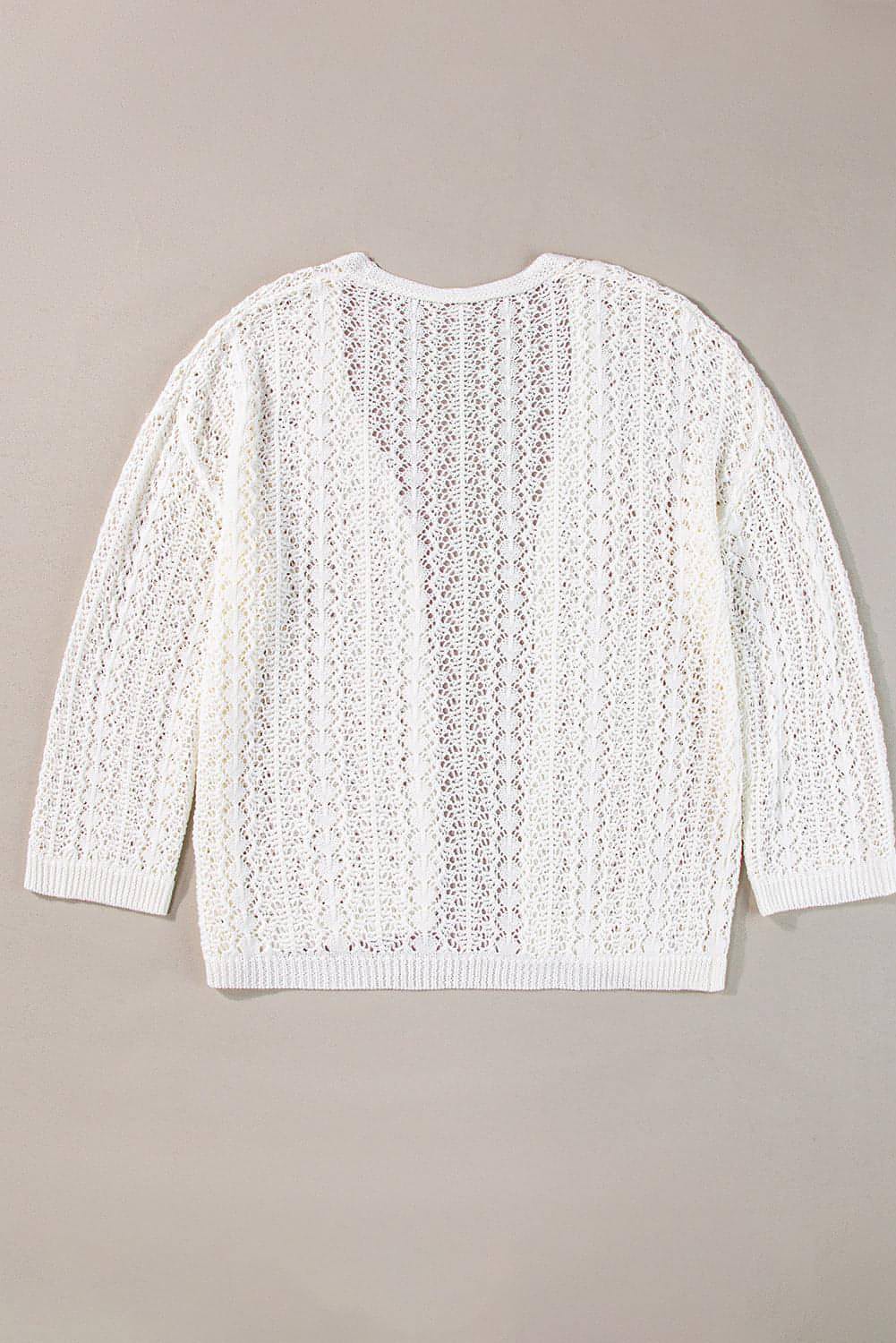 Cardigan blanc élégant en tricot ajouré à épaules tombantes