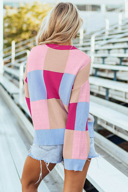 Suéter holgado con cuello redondo y hombros caídos con bloques de color rojo rosa