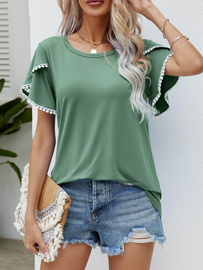 Pom-pom trim fladder hylsa rund hals t-shirt