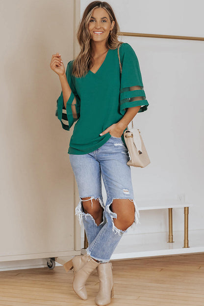 Blusa suelta con escote en V y mangas acampanadas de color verde