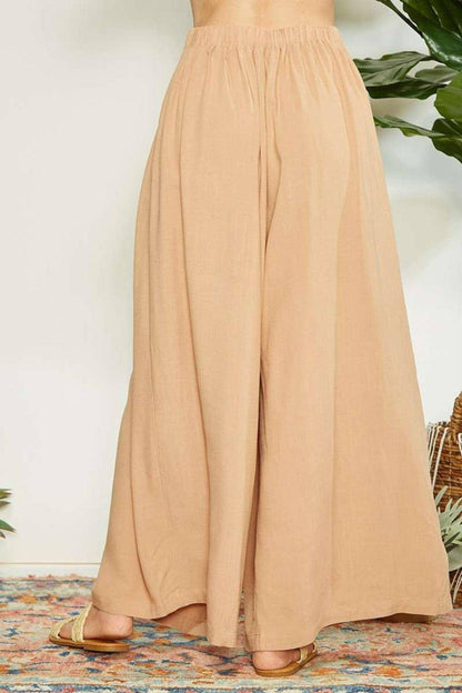 Pantalones de pierna ancha con detalle plisado y cruzado de Mittoshop