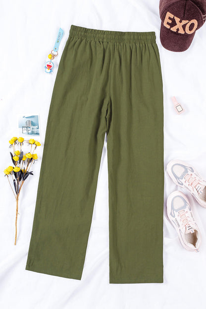 Pantaloni con gambe lunghe e dritte con tasche elastiche in vita con coulisse verde