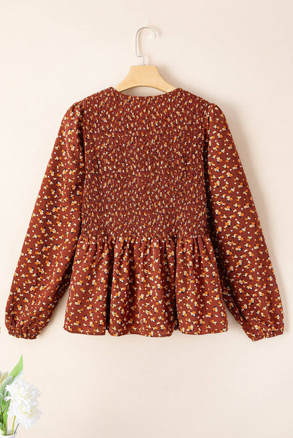 Blusa peplum con volantes y busto fruncido con estampado floral estilo boho