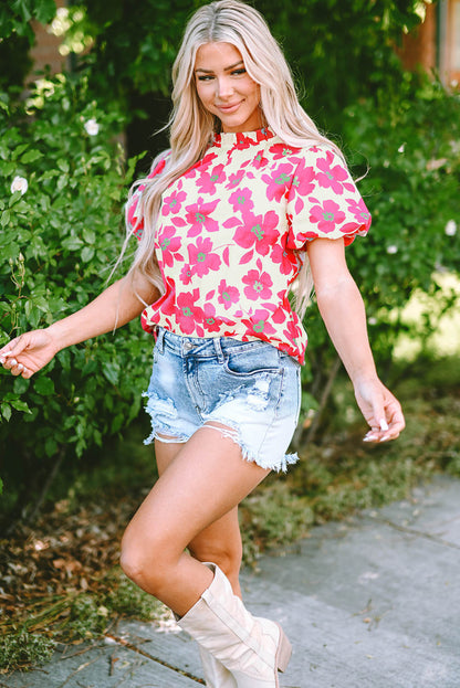 Blusa con escote con volantes y mangas abullonadas con estampado floral beige