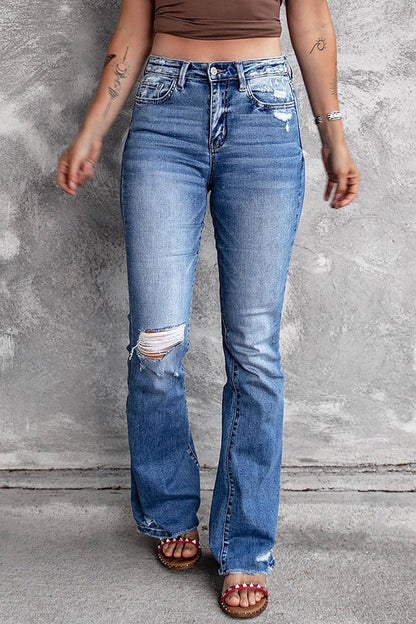 Blauwe noodlijdende flare jeans