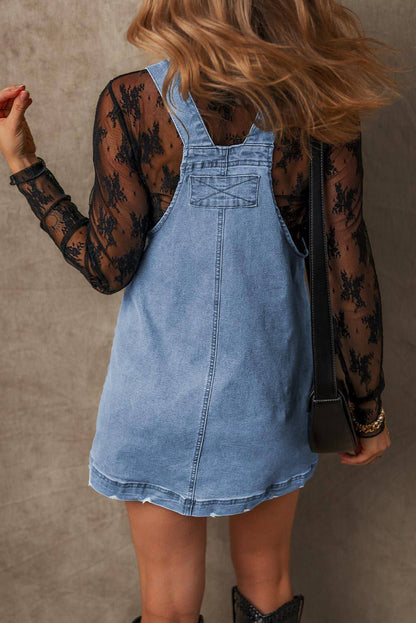 Schemerblauwe denim overall met verstelbare bandjes en zakken