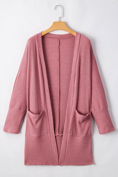 Cardigan en tricot gaufré de couleur unie rouge minéral avec poche