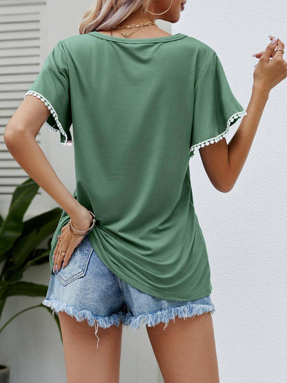 Pom-pom trim fladder hylsa rund hals t-shirt