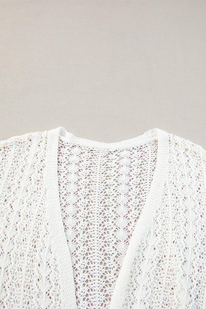 Cardigan blanc élégant en tricot ajouré à épaules tombantes