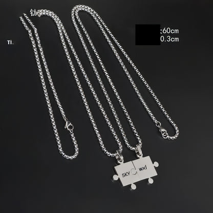 A Pair Of Puzzle Lettering Commemorative Pendant Necklace