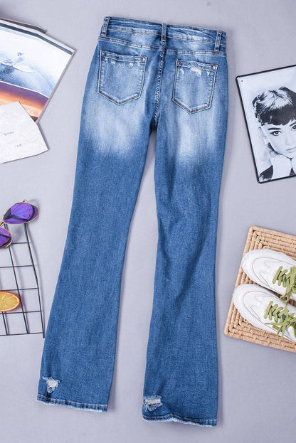 Blauwe noodlijdende flare jeans