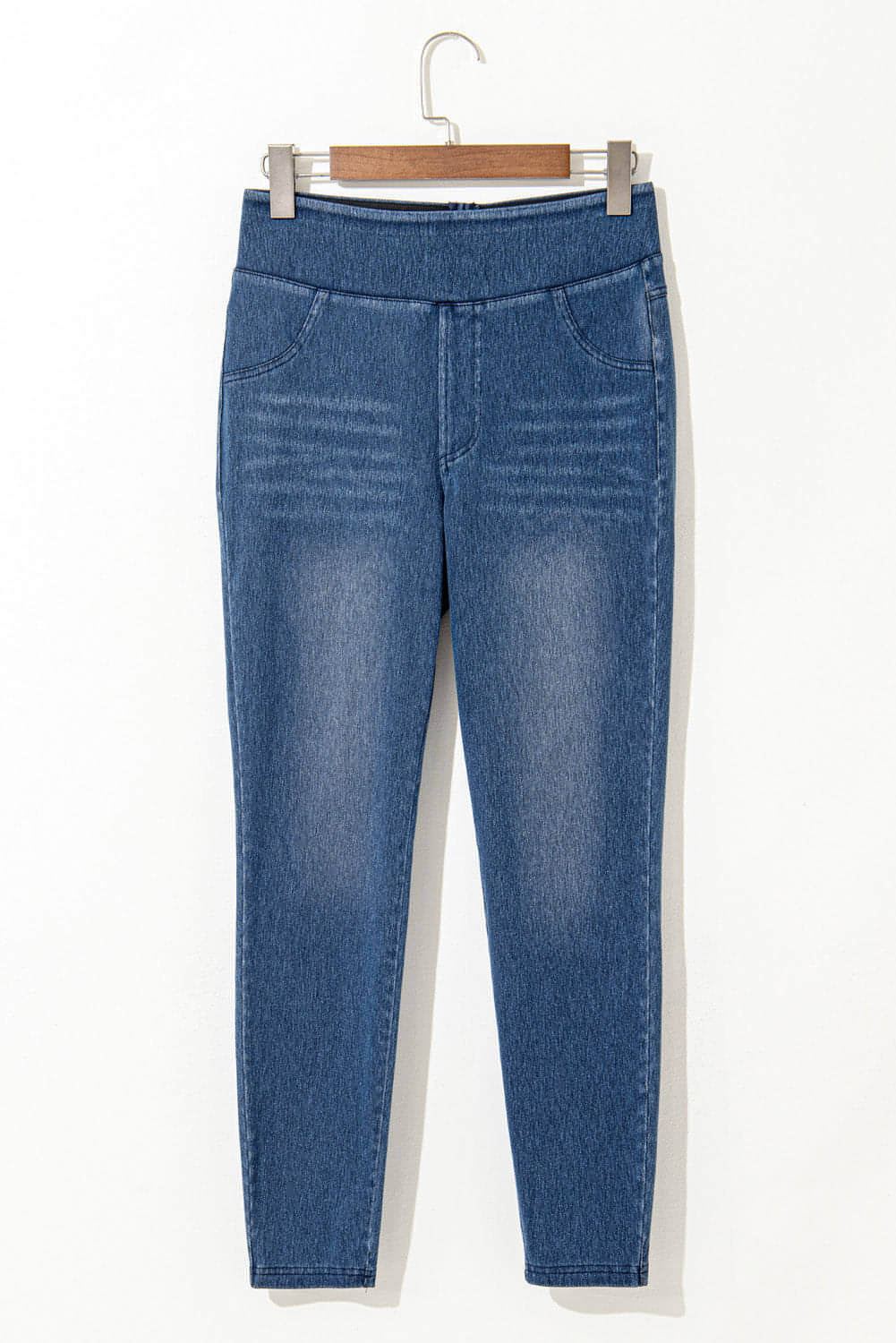 Marineblauwe skinny jegging met elastische taille, enkellange middelhoge taille en zakken