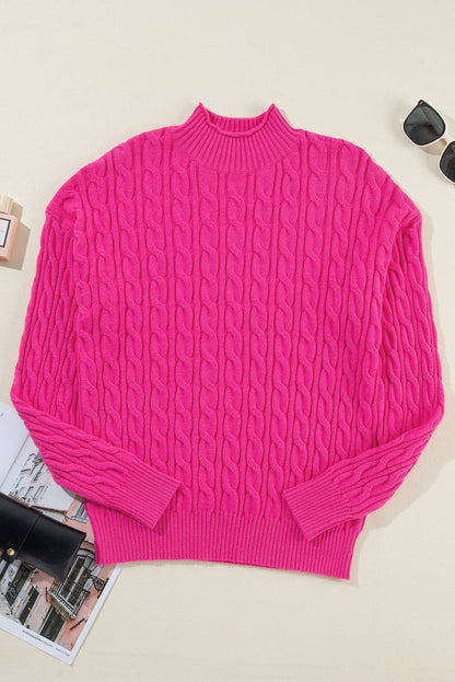 Maglione con spalle scese a collo alto in maglia a trecce tinta unita rosso rosa