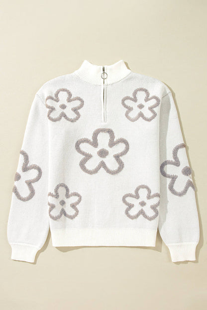 Weißer Pullover mit kontrastierendem Blumenmuster und halbem Reißverschluss und Stehkragen