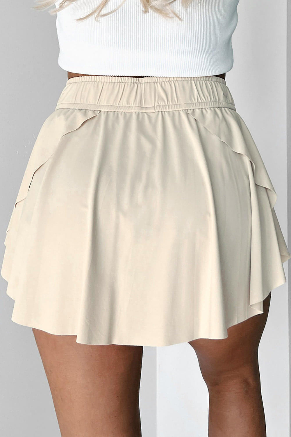 Jupe-short de tennis beige doublée taille haute avec cordon de serrage