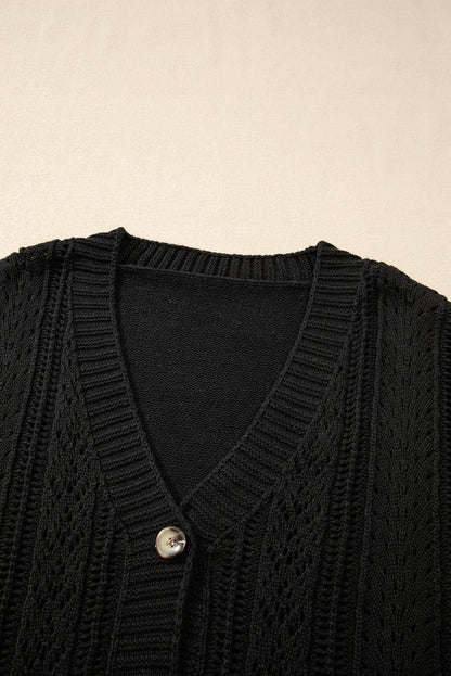 Cardigan maglione con spalle scoperte in maglia aperta nera